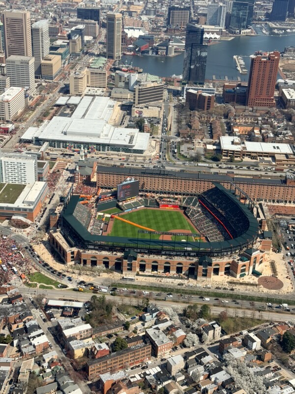 Camden Yards from the biplane towing a banner